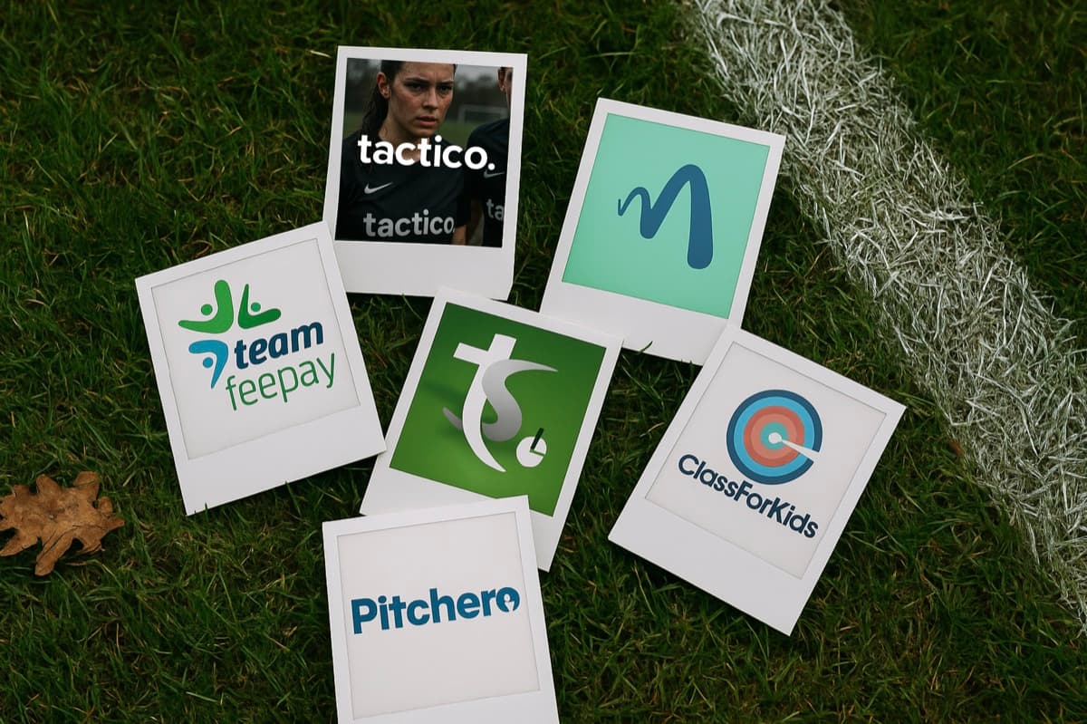 Various football team management app logos including tactico, Pitchero, TeamFeePay, and others displayed as polaroid photos on a grass football pitch, representing the comprehensive 2025 review of team management platforms